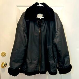 Elegant Black Leather Jacket with Fur Trim